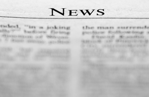 Newspapers on a News Stand
